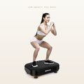 A woman in a white sports bra and shorts stands in a deep squat on a black Withstar vibration plate exercise machine against a light beige background. Text at the top reads 'LOW IMPACT, FULL BODY'.